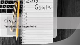  Presentation with work goals - Presentation theme consisting of 2019 goals on his notebook new year resolutions concept top view background and a light gray colored foreground