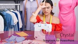  Presentation with sewing machine - PPT theme featuring hispanic-young-woman-dressmaker-designer background and a coral colored foreground