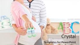  Presentation with bright future - Presentation theme enhanced with close-up of a bright pregnant woman holding baby shoes while husband touching her belly in the room of their future baby at home background and a lemonade colored foreground