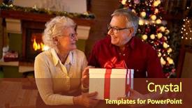  Presentation with christmas gift wrap - PPT theme consisting of holding big gift at christmas background and a tawny brown colored foreground