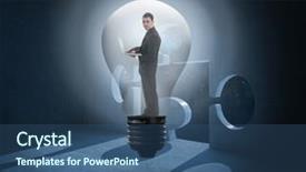  Presentation with light bulb - Slide set having holding laptop in light bulb background and a  colored foreground