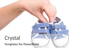  Presentation with baby shoes - Cool new PPT theme with holds small blue baby shoes backdrop and a white colored foreground
