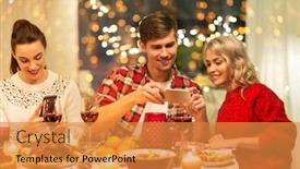  Presentation with christmas food - Beautiful presentation featuring holidays and celebration concept - happy friends having christmas dinner at home and photographing food by smartphone backdrop and a gold colored foreground