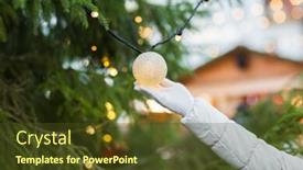  Presentation with christmas holidays - Cool new slide deck with holidays and decoration concept - close up of hand with christmas tree garland bulb outdoors backdrop and a tawny brown colored foreground