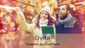  Presentation with old clothes - Audience pleasing presentation theme consisting of holidays winter christmas technology and people concept - happy couple of tourists in warm clothes with tablet pc computer pointing finger in old town backdrop and a coral colored foreground