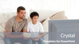  Presentation with cinema - Cool new PPT layouts with home cinema - concentrated father and son watching backdrop and a gray colored foreground