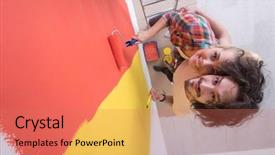  Presentation with college education happy smiling - PPT theme consisting of home renovation - happy smiling young couple painting background and a coral colored foreground