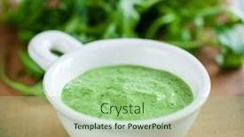  Presentation with olive - Audience pleasing slide deck consisting of homemade basil and pine nuts pesto sauce in glass jar with parmesan cheese and olive oil backdrop and a mint green colored foreground