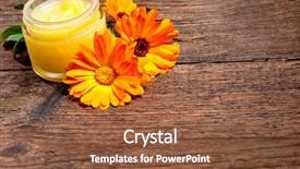  Presentation with calendula - Colorful slide deck enhanced with homemade calendula ointment on wooden backdrop and a tawny brown colored foreground