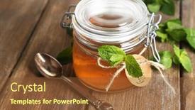 Presentation with mint - PPT theme enhanced with homemade mint jelly in glass jar on wooden background background and a tawny brown colored foreground