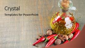  Presentation with olive oil bottle - Slides enhanced with homemade natural infused olive oil with red chili peppers and spices in glass bottle on wooden background background and a coral colored foreground