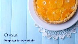  Presentation with color orange - Beautiful theme featuring homemade orange tart on plate on color wooden background backdrop and a light blue colored foreground