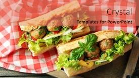  Presentation with meatball - Presentation consisting of homemade spicy meatball sub sandwich on tray on wooden table background background and a coral colored foreground