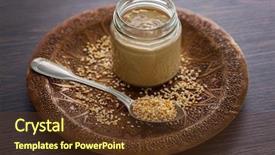  Presentation with sesame seeds and oil - Amazing slide deck having homemade tahini with sesame backdrop and a tawny brown colored foreground