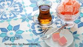  Presentation with turkish - PPT theme consisting of homemade-turkish-delight-lokum-rose background and a light blue colored foreground