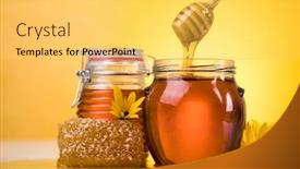  Presentation with honey - PPT theme having honey dripping from a wooden honey dipper in a jar background and a yellow colored foreground