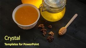  Presentation with walnut - Amazing PPT theme having honey with walnut on wooden backdrop and a wine colored foreground