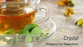  Presentation with tea leaves - Audience pleasing theme consisting of hot spices - tea cup with fresh mint backdrop and a soft green colored foreground