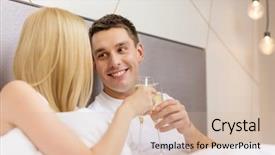  Presentation with relationships - Presentation theme with hotel travel relationships and happiness concept - smiling couple with champagne glasses in bed background and a soft green colored foreground