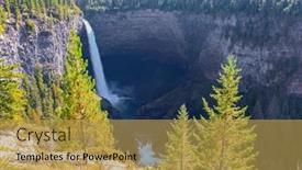  Presentation with rocky mountains - Theme consisting of huge-magnificent-helmken-waterfall background and a yellow colored foreground