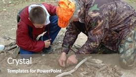  Presentation with survival - Audience pleasing PPT theme consisting of hunter education instructor teaching fire backdrop and a gray colored foreground