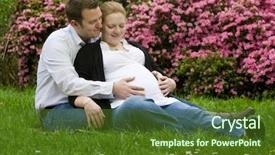  Presentation with maternity - PPT theme enhanced with husband and wife maternity expecting a child or baby posing in the park background and a tawny brown colored foreground