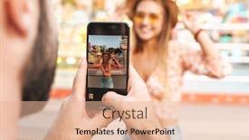  Presentation with amusement park - PPT layouts consisting of image of a man take photo of his positive optimistic woman walking outdoors in amusement park by mobile phone background and a coral colored foreground