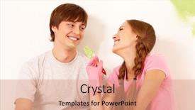  Presentation with improvement - PPT theme consisting of image of joyful girl painting lad s face with green color while both laughing during improvement of flat background and a coral colored foreground