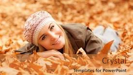  Presentation with dry - Theme featuring image of pretty woman laying down on the ground covered dry autumnal foliage in beautiful park background and a gold colored foreground