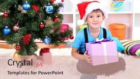  Presentation with child tree - PPT theme enhanced with impeccable - child in santa hat sits background and a  colored foreground