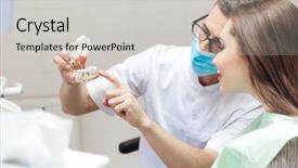  Presentation with dentures - Amazing PPT theme having implant - man dentist show dentures teeth backdrop and a light gray colored foreground