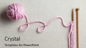  Presentation with needles - Presentation with incomplete knitting project with wooden background and a light gray colored foreground