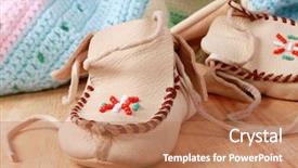  Presentation with baby shoes - Presentation theme enhanced with indian clothing - baby shoes on wooden floor background and a coral colored foreground