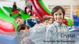  Presentation with happy kids - PPT layouts with inflatable slide - happy kids at indoor playground background and a light blue colored foreground