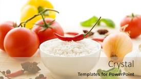  Presentation with spicy food - Colorful presentation theme enhanced with ingredients for spicy asian food with a bowl of uncooked basmati rice fresh vegetables and spices backdrop and a coral colored foreground