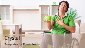 Presentation with wheelchair - PPT theme having injured piggy bank - young handsome man in wheelchair background and a soft green colored foreground