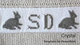  Presentation with embroidery - Audience pleasing slide deck consisting of instinal - english initials and bunny embroidered backdrop and a light gray colored foreground