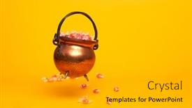  Presentation with orange colored - Colorful presentation enhanced with iron pot with multi-colored sweets on blank orange background backdrop and a light gray colored foreground