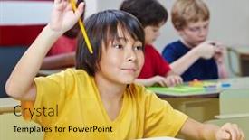  Presentation with elementary - Amazing PPT theme having japanese elementary school student raising his hand in class backdrop and a yellow colored foreground