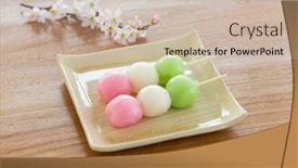  Presentation with stuck - Amazing presentation design having japanese sweets of dumplings stuck in a skewer backdrop and a soft green colored foreground