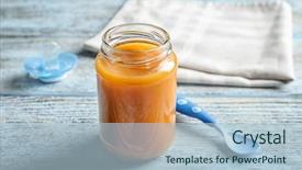  Presentation with baby food jar - Beautiful PPT theme featuring jar with healthy baby food backdrop and a light blue colored foreground