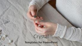  Presentation with pearl - Cool new PPT theme with jewelry-designer-working-in-studio backdrop and a light gray colored foreground