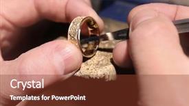  Presentation with manufacturing - Presentation theme having jewelry manufacturing - jeweler working on golden ring background and a tawny brown colored foreground