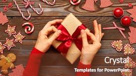  Presentation with gift - Beautiful PPT theme featuring jingle - female hands on christmas gift backdrop and a tawny brown colored foreground