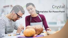  Presentation with jolly - PPT layouts consisting of jolly young creative artists concentrated on pumpkin painting working together in studio and creating new design for food background and a sky blue colored foreground