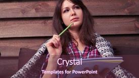  Presentation with hand holding pencil - Colorful theme enhanced with jotter - low angle of thoughtful student backdrop and a tawny brown colored foreground