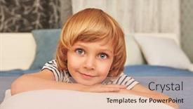  Presentation with childhood - Colorful PPT theme enhanced with joyful-funny-kid-lying backdrop and a coral colored foreground