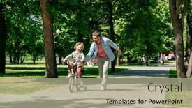  Presentation with summer trees - Beautiful slide deck featuring joyful-little-boy-riding-bicycle backdrop and a mint green colored foreground