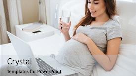  Presentation with pregnant woman in hospital - PPT theme with joyful waiting - smiling pregnant young woman using background and a lemonade colored foreground