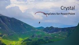  Presentation with scenery - PPT theme having jumping mountains - paraglider flying over the breathtaking background and a light blue colored foreground